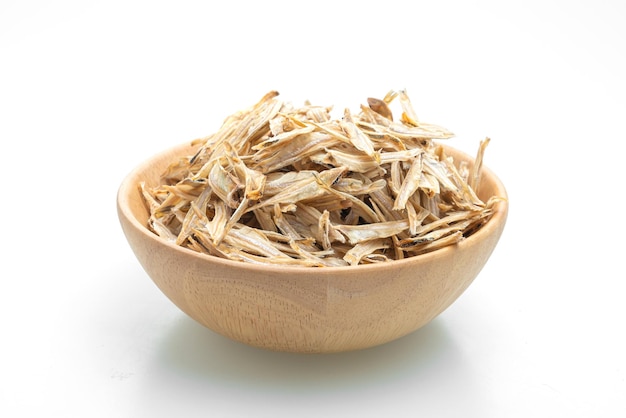 Dried small crispy fish on white background