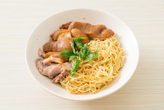 dried stewed pork leg noodles bowl - Asian food style