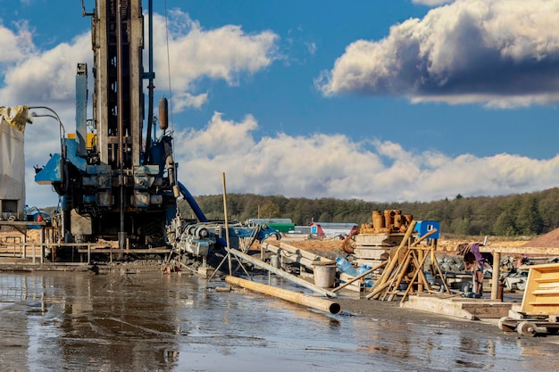 Drilling rig close-up at a construction site. Deep hole drilling. Extraction of minerals oil and gas. Working process.