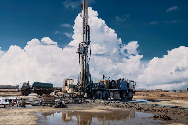 Drilling rig close-up at a construction site. Deep hole drilling. Extraction of minerals oil and gas. Working process.