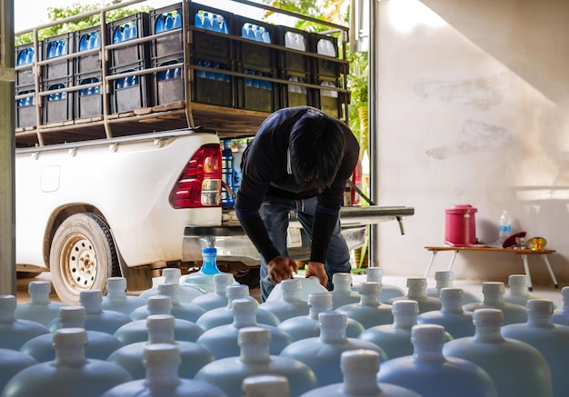 Drinking water clear and clean in white plastic gallon arranged in a row Prepare small business