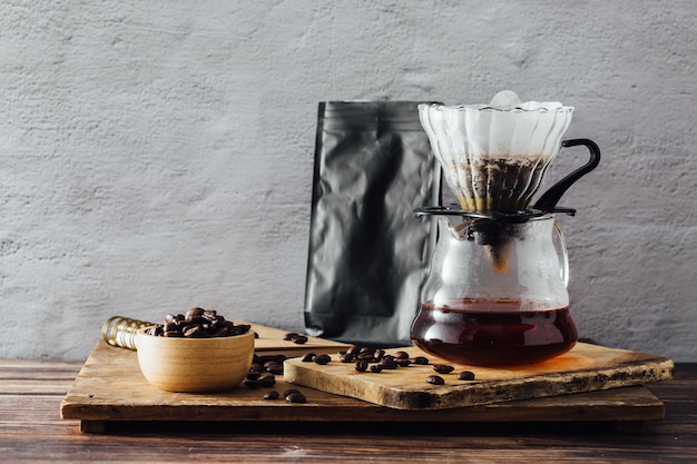 drip coffee on wooden table background