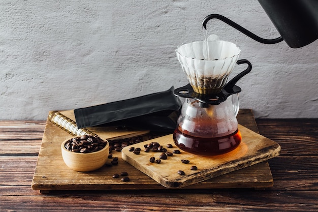 drip coffee on wooden table background