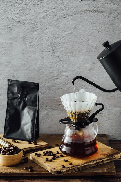 drip coffee on wooden table background