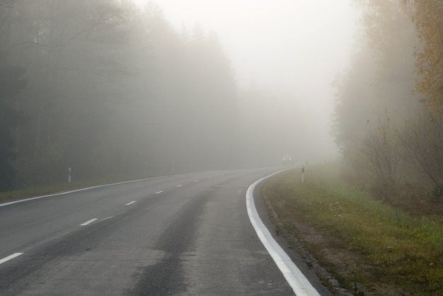 Driving on countryside road in fog.