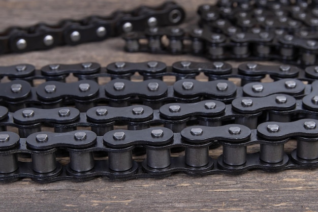 Driving roller chain on wooden table