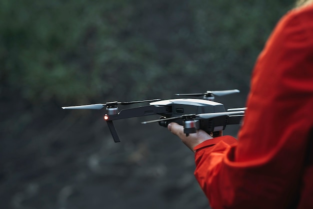 Drone ready to fly off a hand