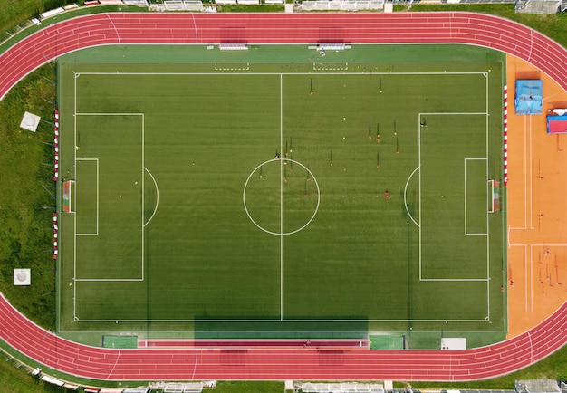 Drone view of soccer field in summer