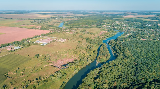 Photo drone with a camera, beautiful summer small river from a height