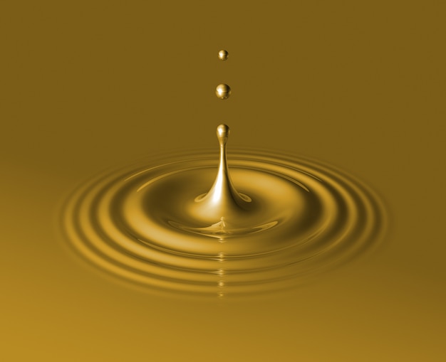 Drop of liquid gold splashing and making ripple.