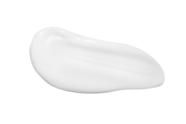 A drop of liquid smeared white cream on a white background Isolated