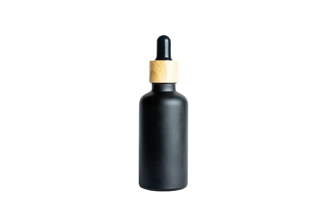 A dropper bottle with serum or gel isolated on white background Beauty concept for face and body care Skincare products natural cosmetic Black matte glass package