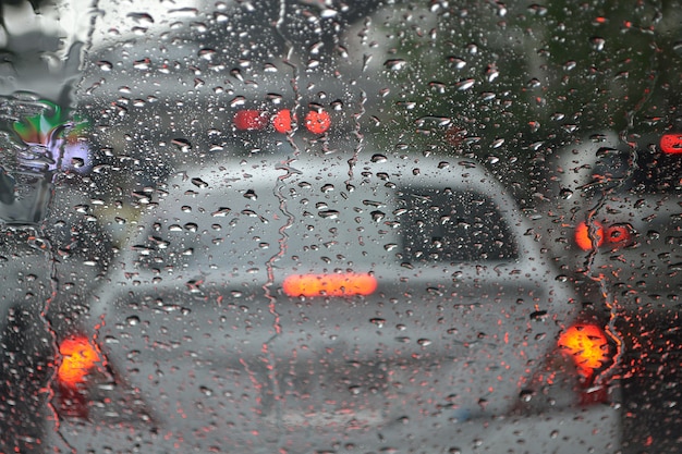 Drops of rain on glass car background. on Street