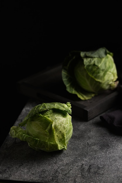 Drops of water on the cabbage Macro photography of vegetables Closeup of green cabbage Fresh