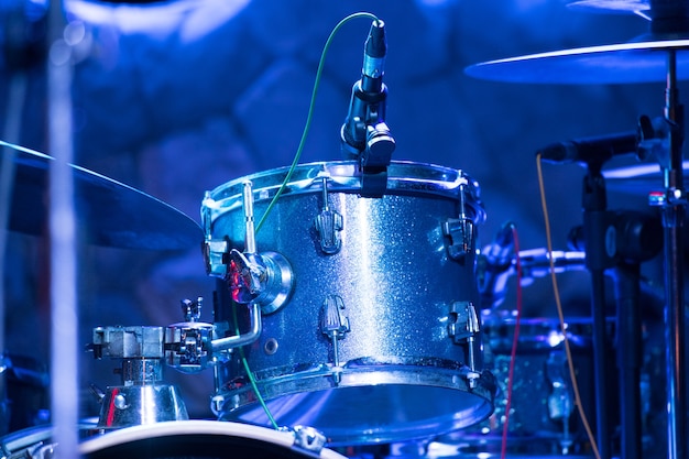 drum set on stage in a concert hall