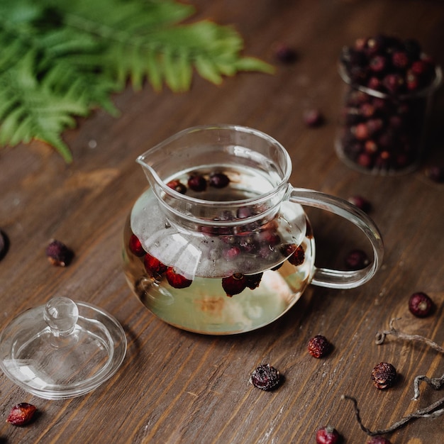 Dry briar berries on wooden table