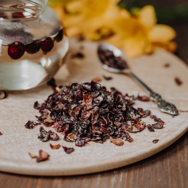 Dry briar berries on wooden table