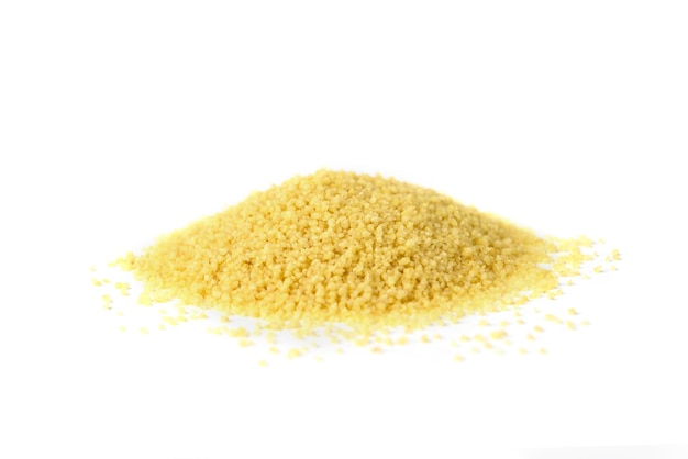 Dry couscous isolated on white background.