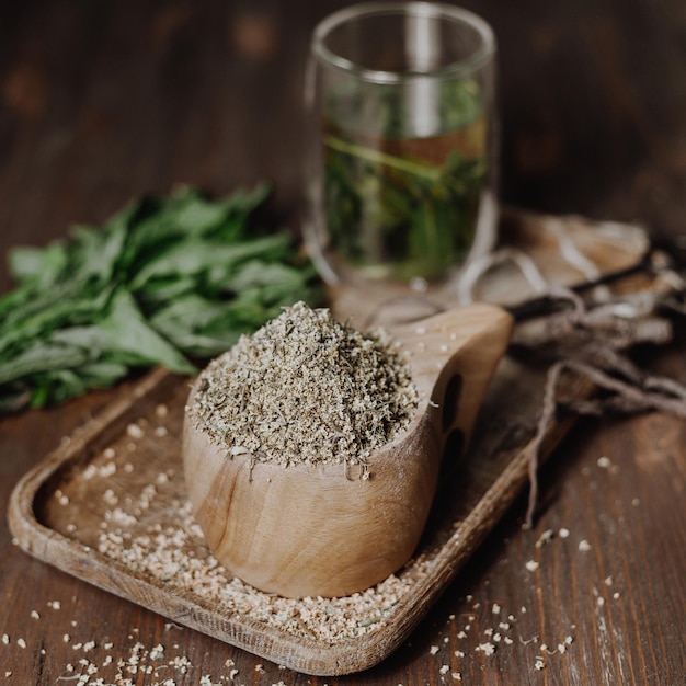 Dry elder blossom flower in wooden cup