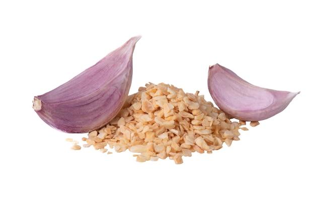 Dry garlic granules isolated on white background Dry garlic and fresh garlic Dry ground garlic