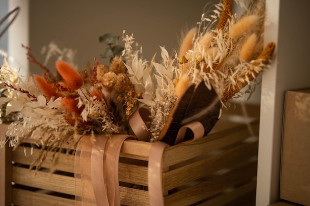 Dry inflorescences collected in a wooden box, comfort and warmth