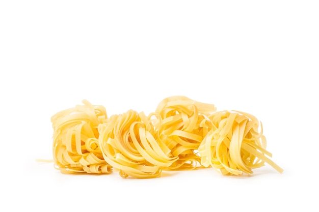 Dry nest noodles isolated on a white background with copy space