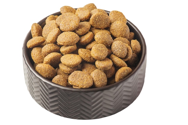 Dry pet food in a black bowl Food is balanced for animals