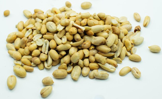 Dry shelled peanuts as background top view Healthy snack