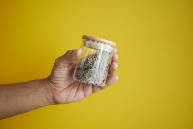 Dry tea leaves in a jar