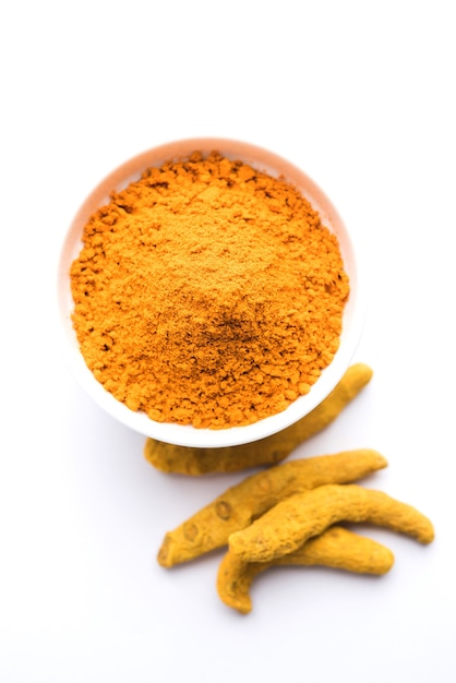 Dry Turmeric Dust or Haldi Powder also known as curcuma longa linn, selective focus