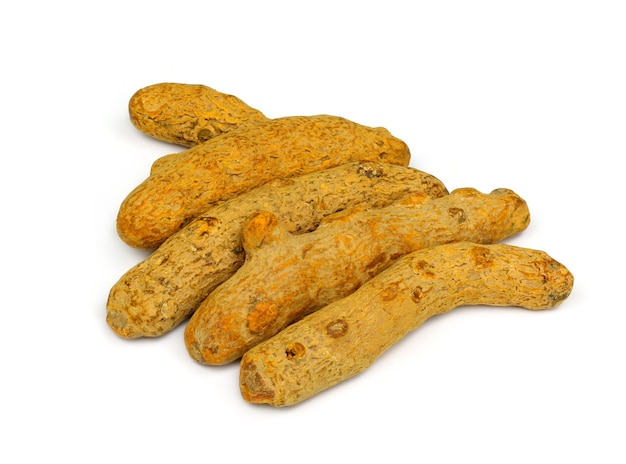 Dry turmeric over white background