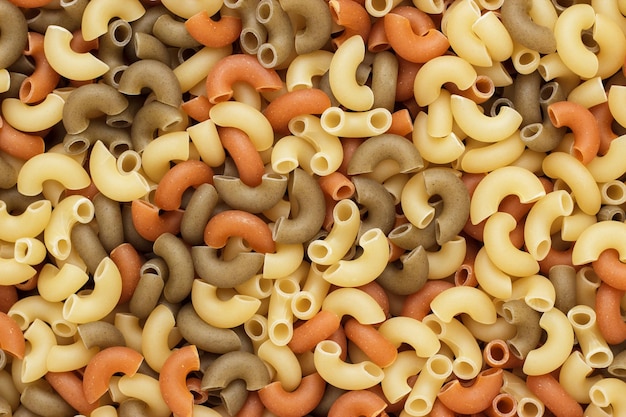 Dry uncooked pasta texture background