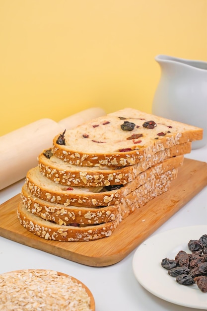 Dry wheat bread with sugar topping yellow background