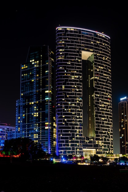 Dubai city at night reflection of lights on the surface of the water urban landscape