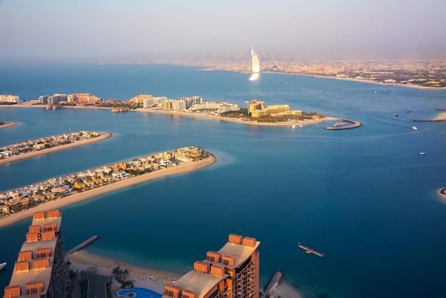 Dubai city panoramic view from water and Palm Jumeirah