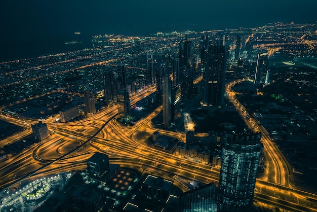 Dubai downtown night scene with city lights Top view from above