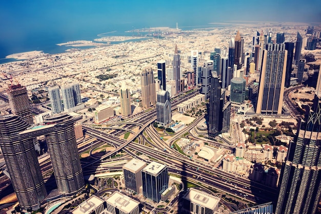 Dubai skyline on sunset modern city with skyscrapers