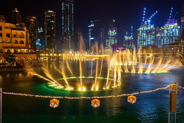 Dubai UAE Dancing fountains night background selective focus Dubai UAE Shallow depth of field