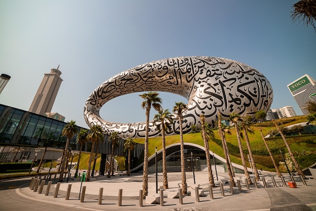 DUBAIUnited Arab Emirates8112021  Museum of The Future New Attraction  in Dubai downtown built for EXPO 2020 Amazing Modern Architecture Design of building with Arabic poetry on its exterior