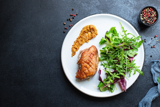 duck breast fried and salad leaves portion grill or barbecue roasted meat poultry