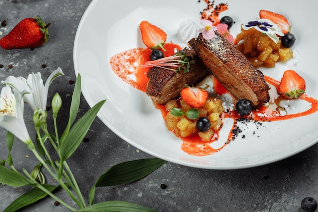 Duck breast with strawberry sauce.bon appetit