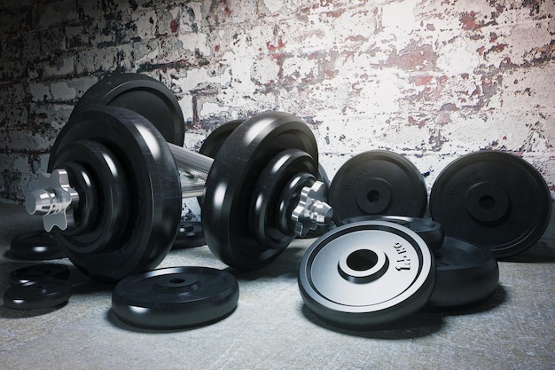 Dumbbell and plates on floor