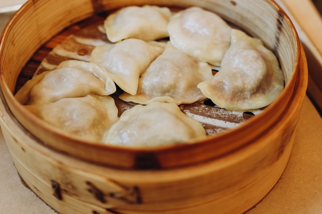 Dumplings, filled with cherries, berries. Pierogi, varenyky, vareniki, pyrohy - dumplings with filling, popular dish in many countries. View from above