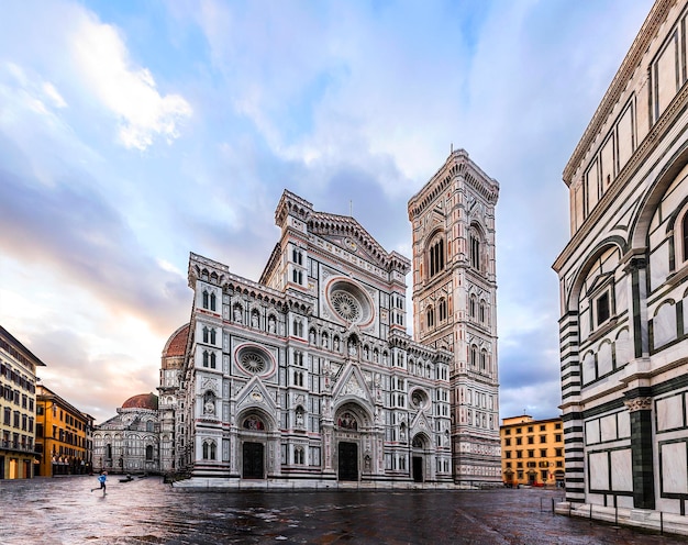 Duomo di Firenze Cathedral at dusk with the Baptistery of StJohn in view Florence Italy Europe in front of white background