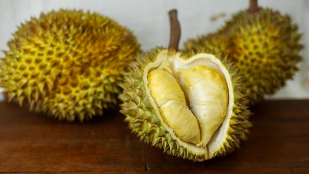 The Durian fruit cut open to reveal fleshy inside. Durian is known as the king of fruit