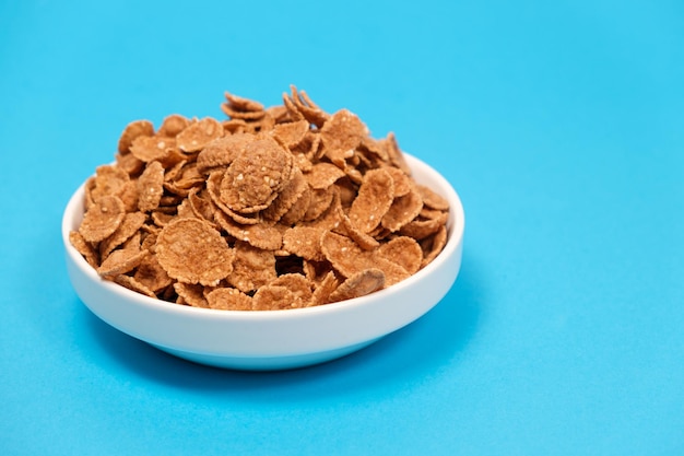 Durum wheat flakes quick breakfast cereal on a plate