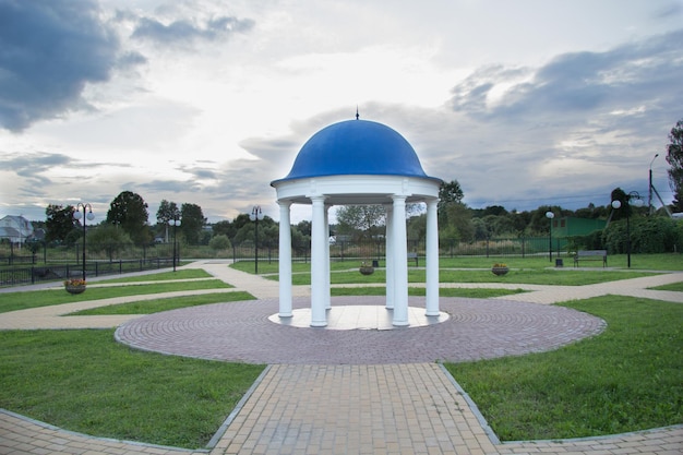 At dusk alcove with tall white pillars