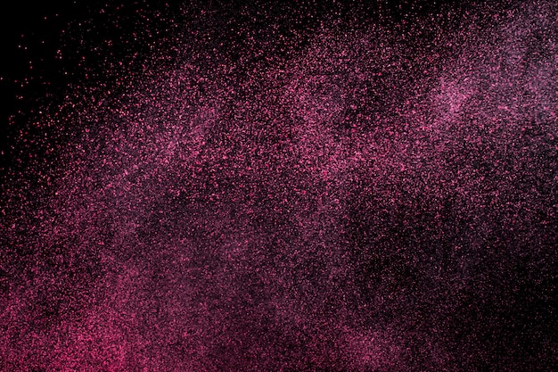 Dust explosion on a black background for graphic resources.