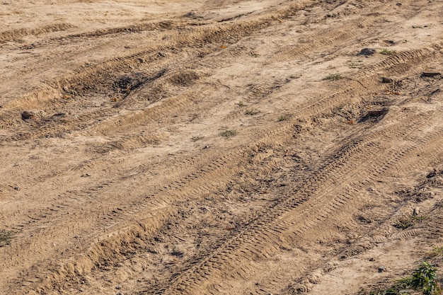 Dusty dry dirt road full frame closeup shot