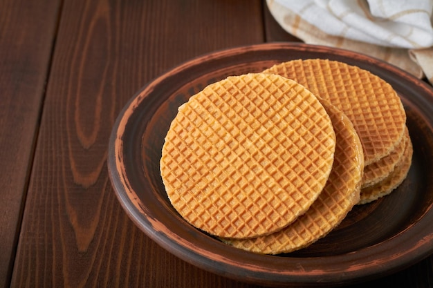 Dutch waffles stroopwafel syrup waffle caramel waffle on brown background